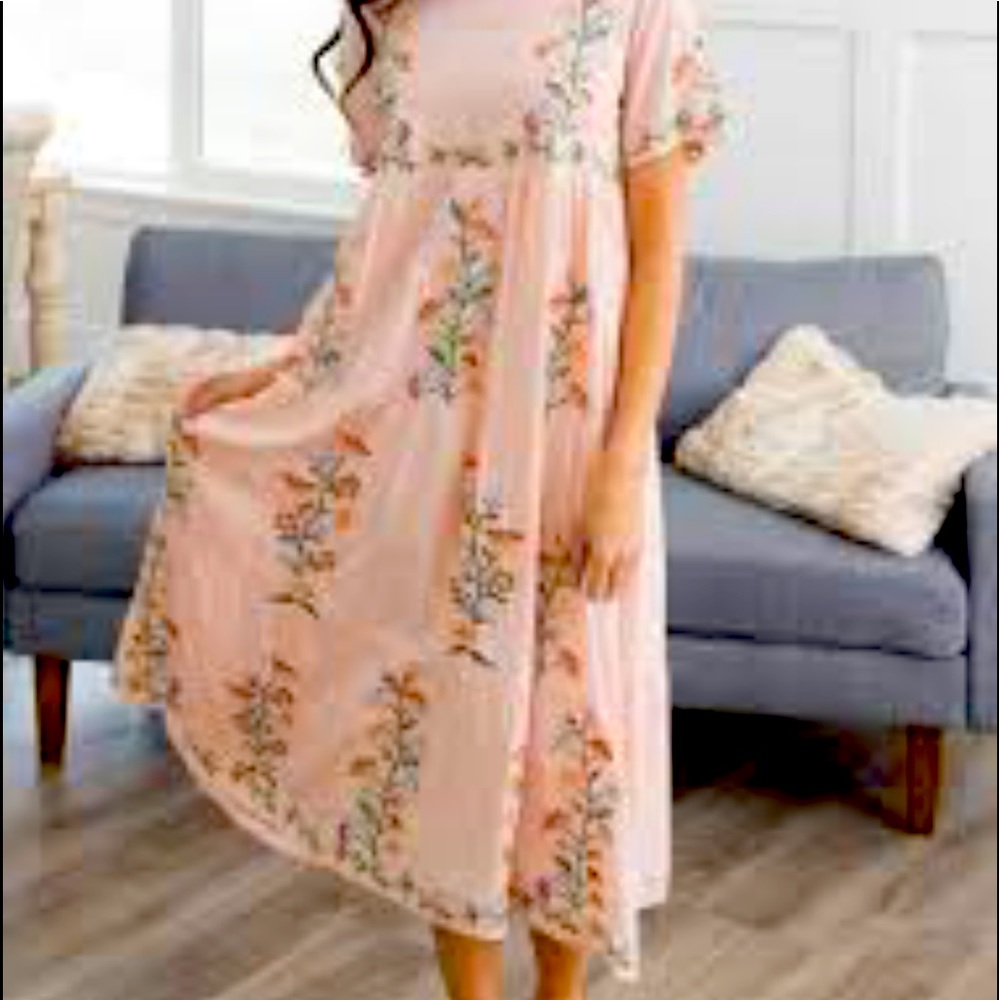 Beautiful and unique embroidered tiered Dress